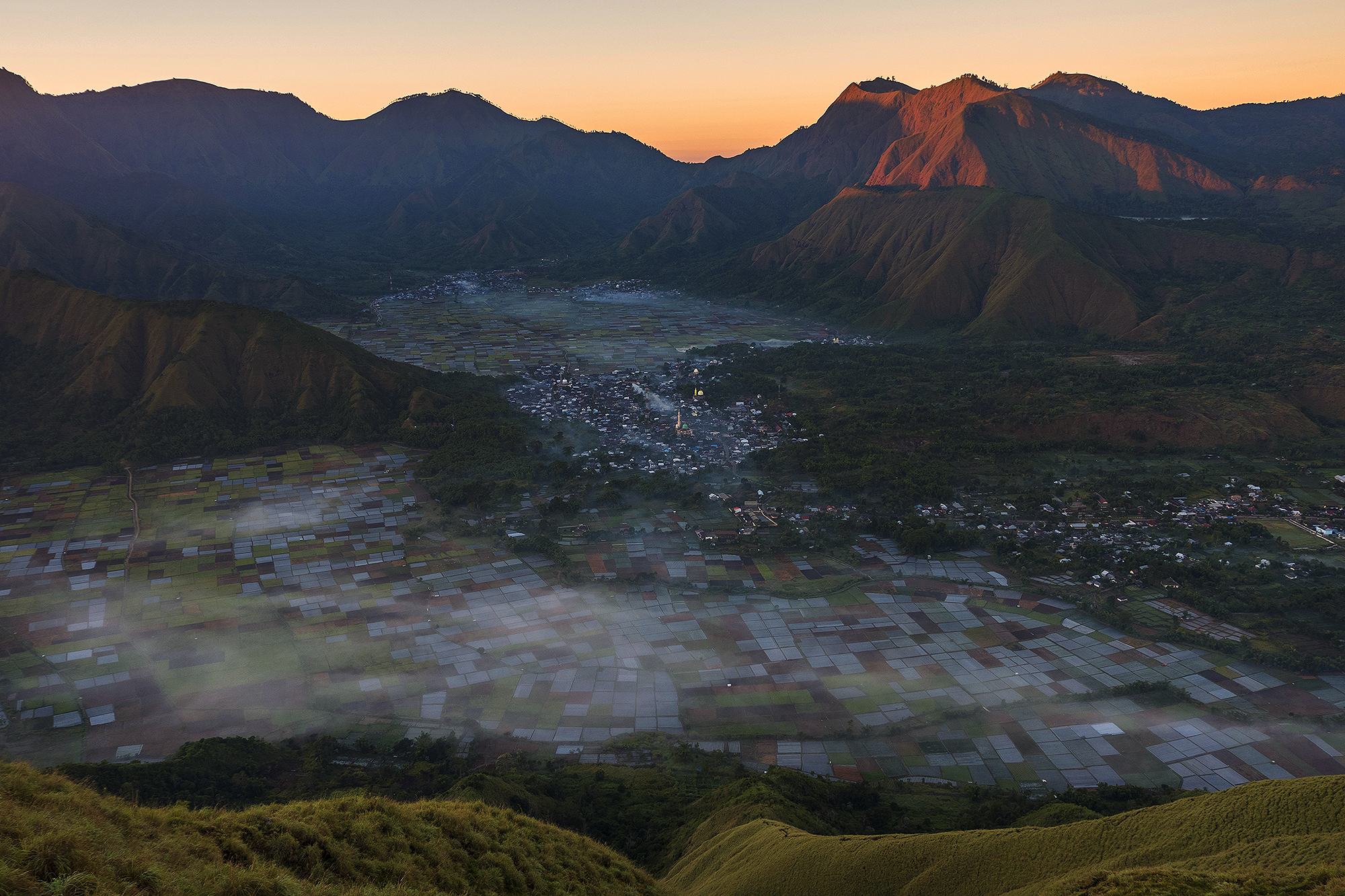 Panoramic view of Sembalun village and its farmland from the summit of Bukit Pergasingan, East Lombok
