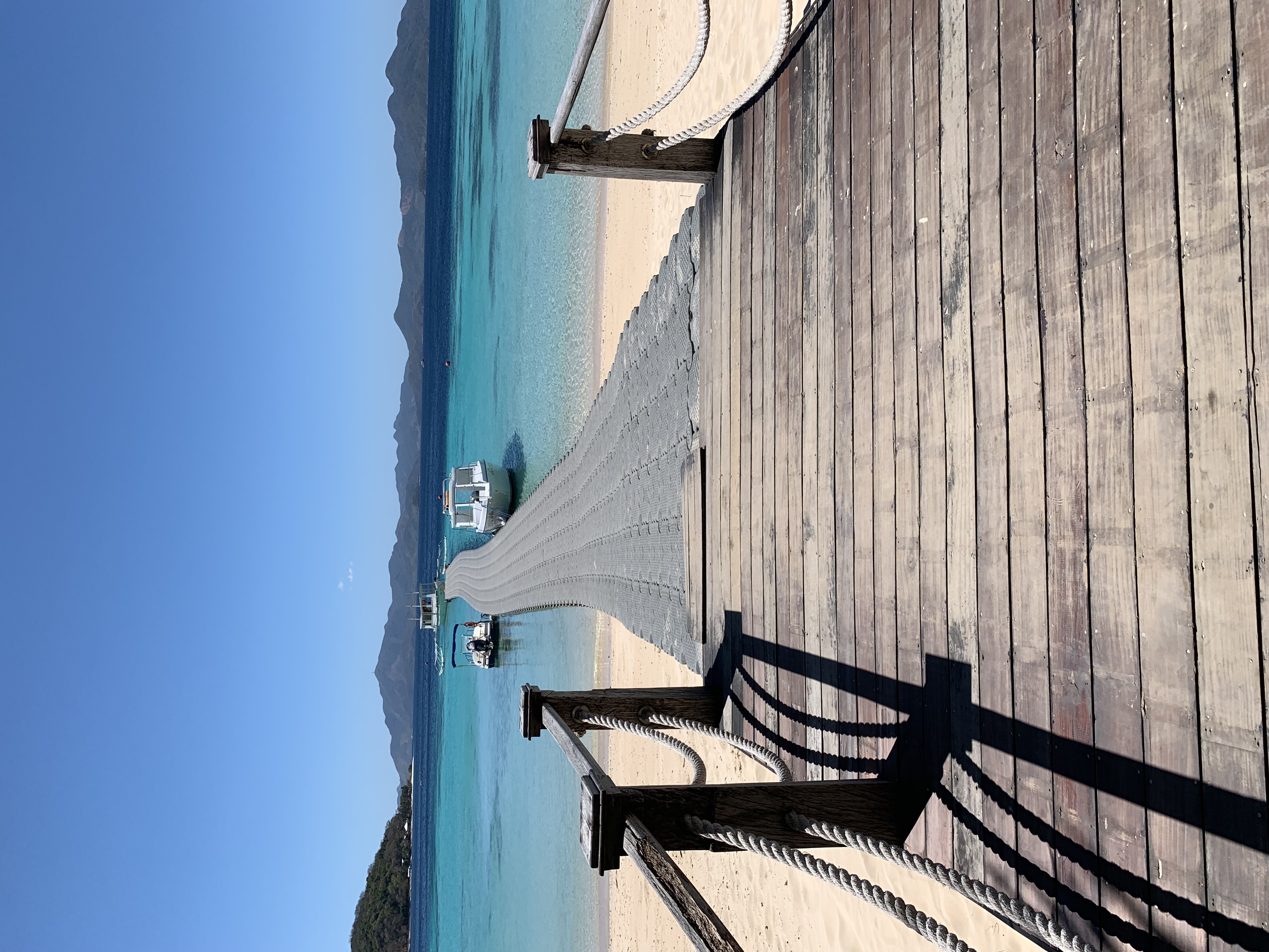 Two Seasons resort jetty and bungalows on Bulalacao Island, Coron, Palawan