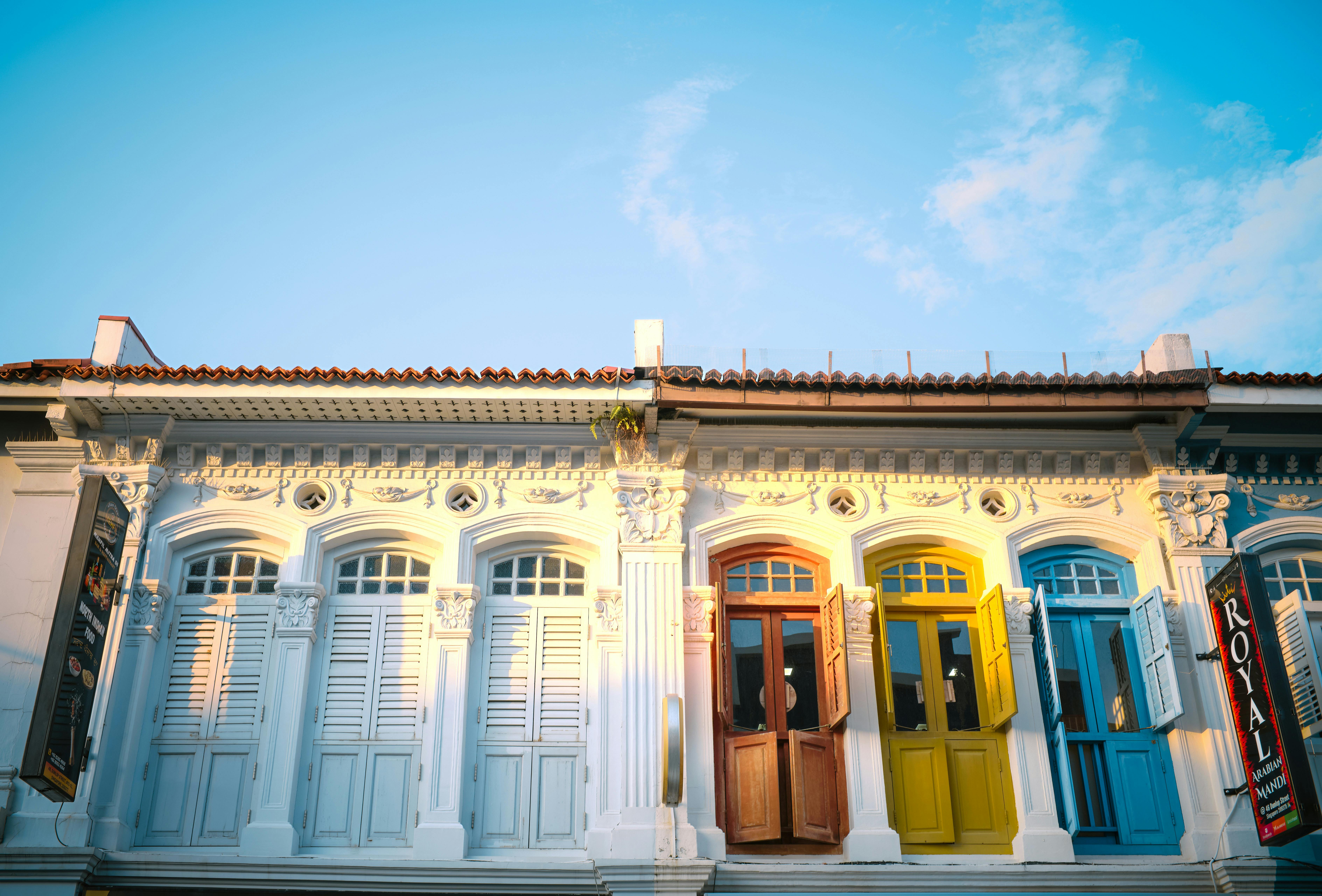 Singapore shophouse facade in raking golden side-light