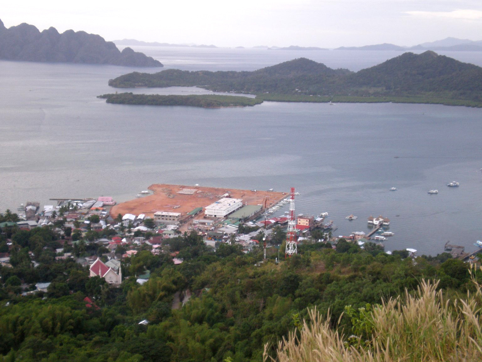 Coron Bay overview from the Mount Tapyas viewing deck, with Coron Island's karst spires across the water