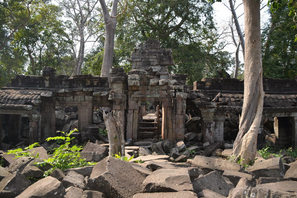 Banteay Chhmar laterite temple entrance with forest behind