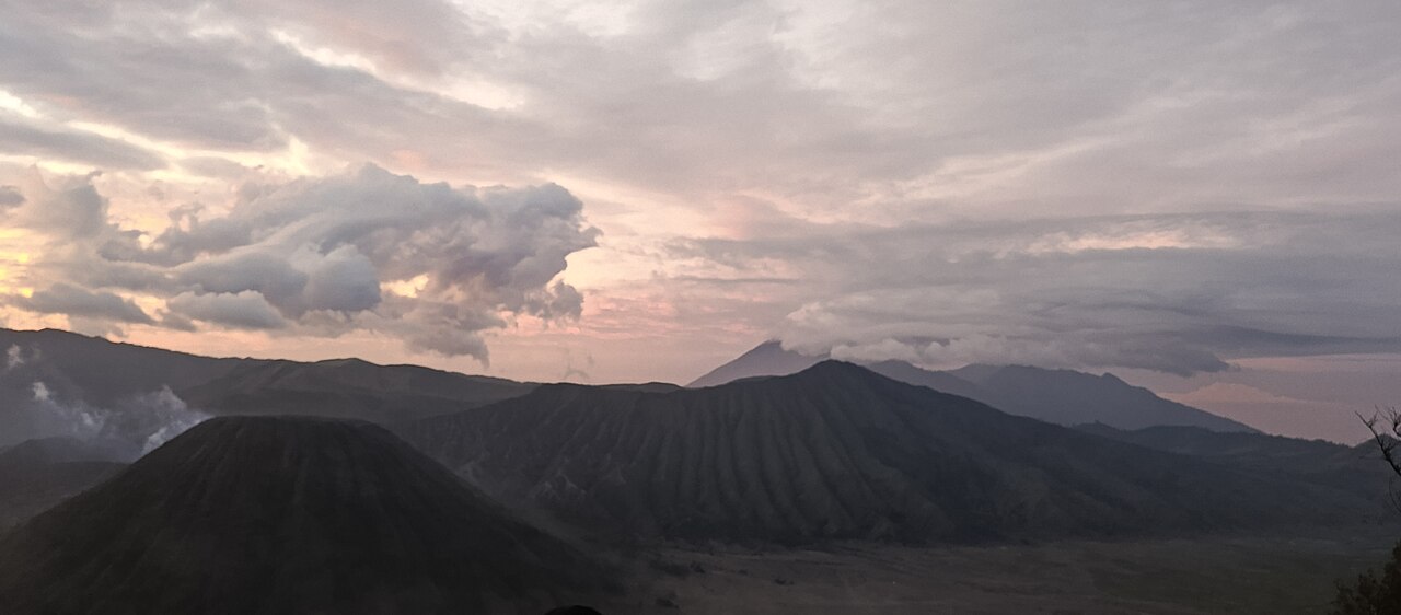 Mount Bromo caldera steaming at sunrise, Java