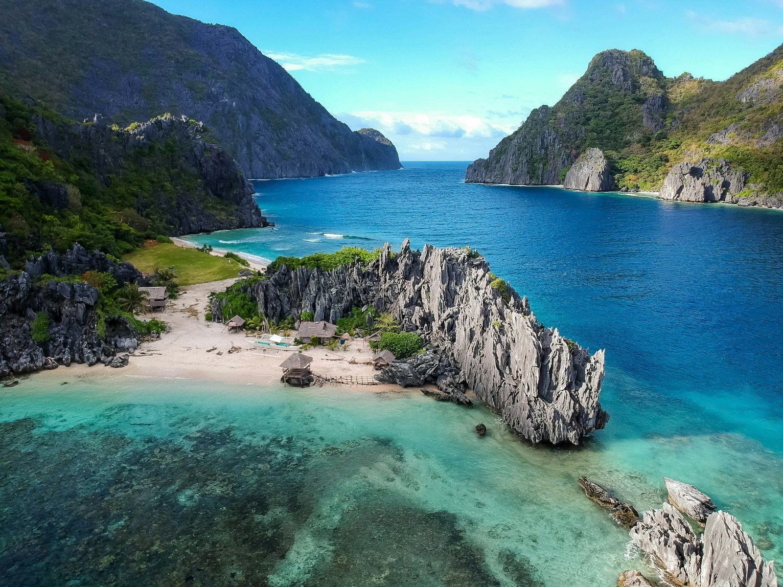 Aerial view of Palawan limestone islands and turquoise channel