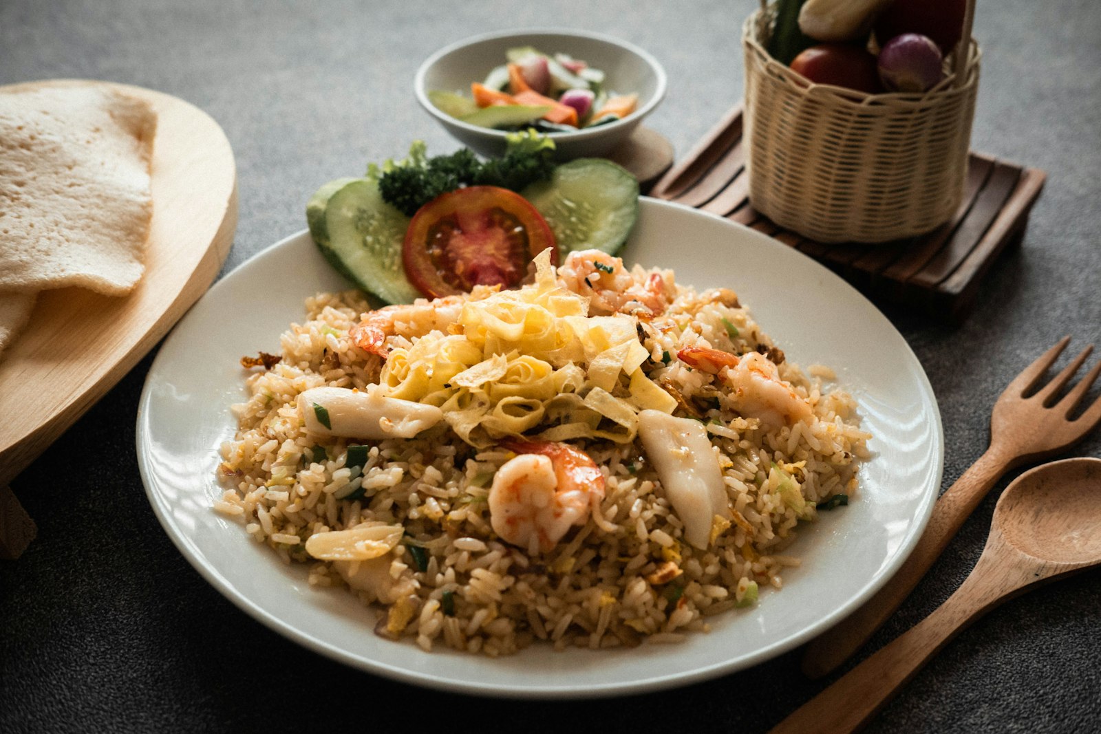 Plate of Indonesian rice with shrimp and vegetables