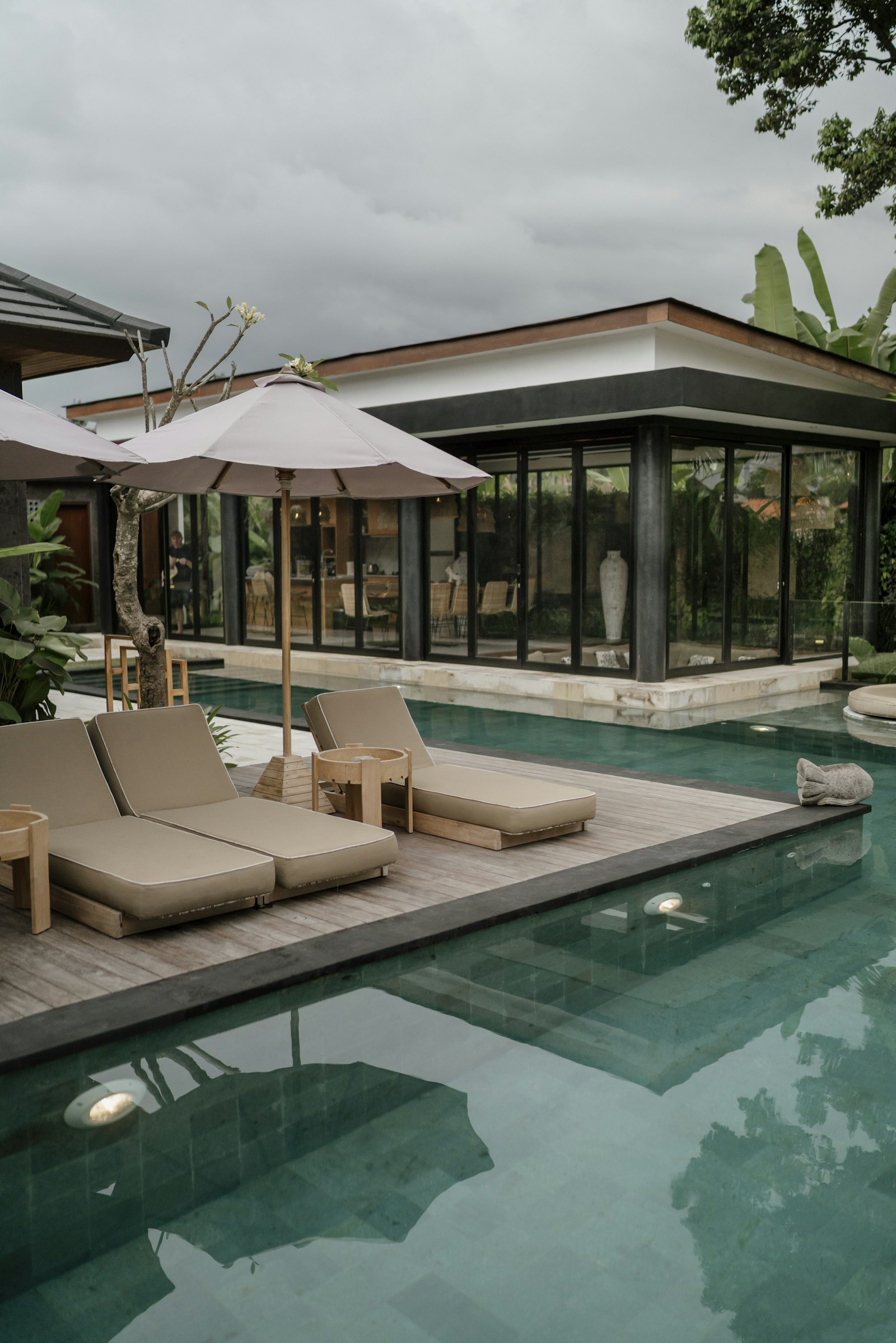 Pool with loungers at a Bali villa