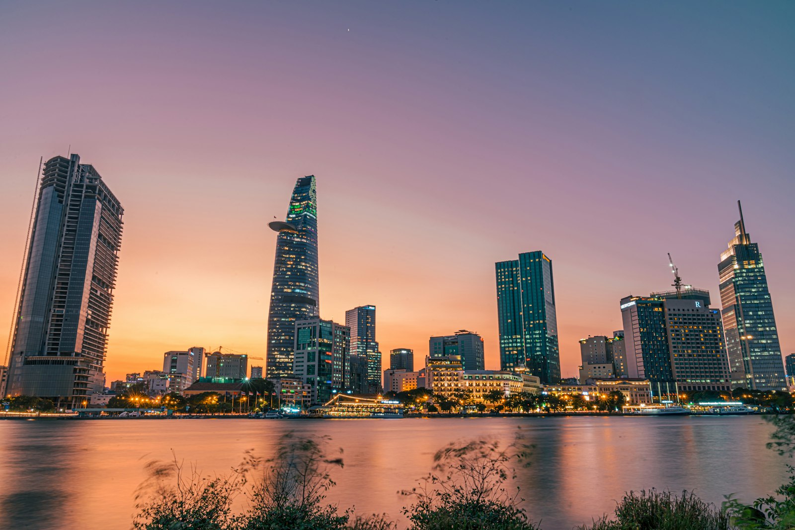 Ho Chi Minh City skyline at dusk over the river