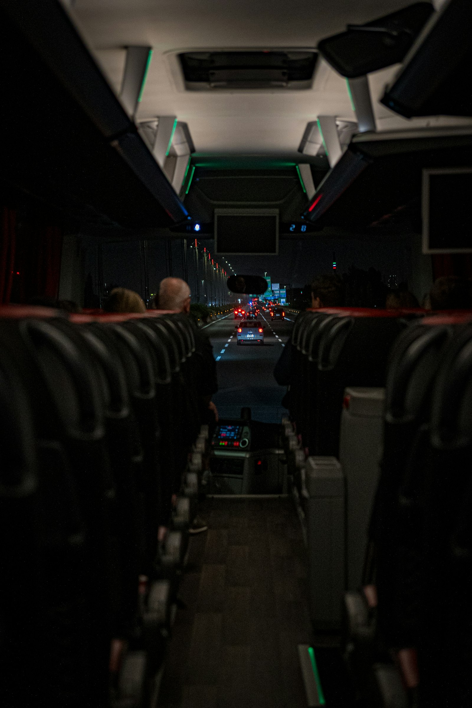 View from inside a bus traveling at night