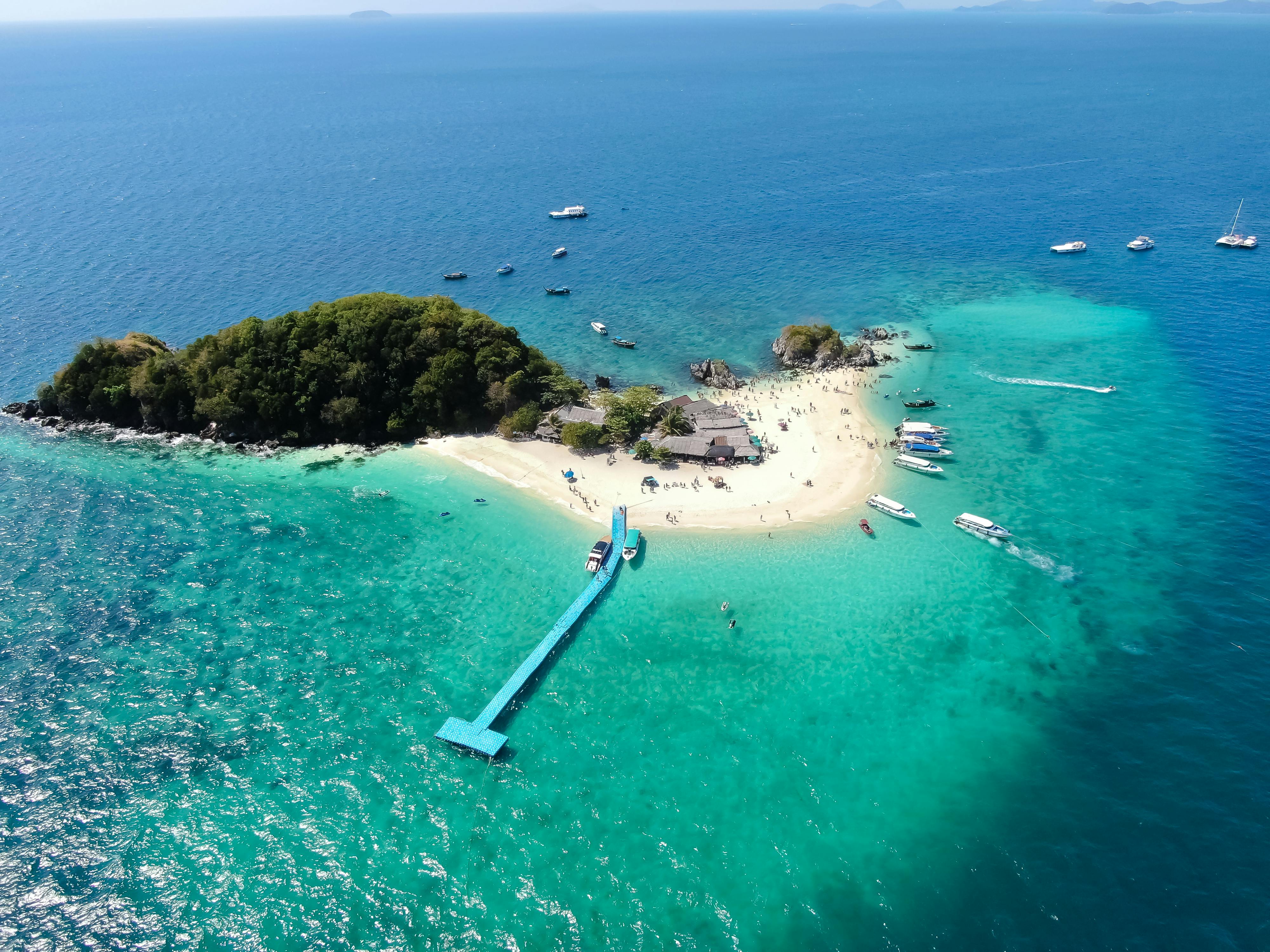 Aerial view of turquoise water and white-sand beach near Phuket