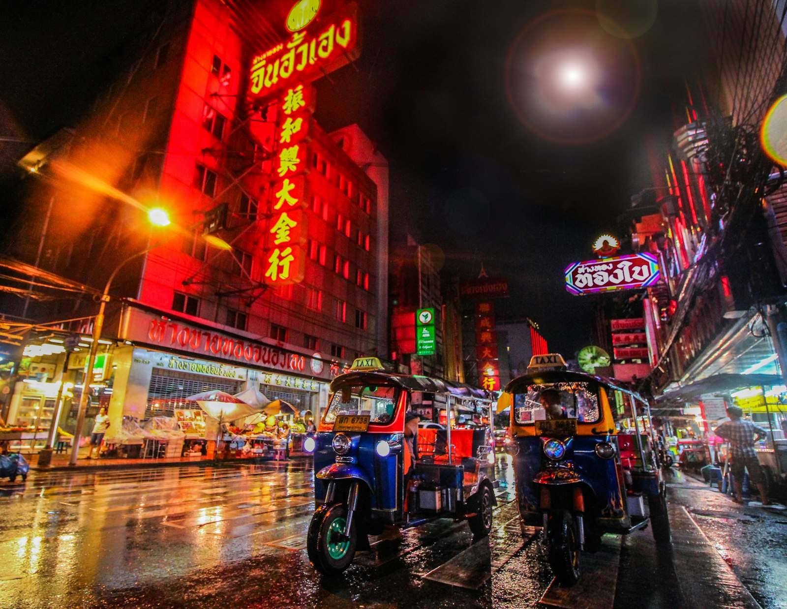 Bangkok Chinatown at night with tuk-tuks
