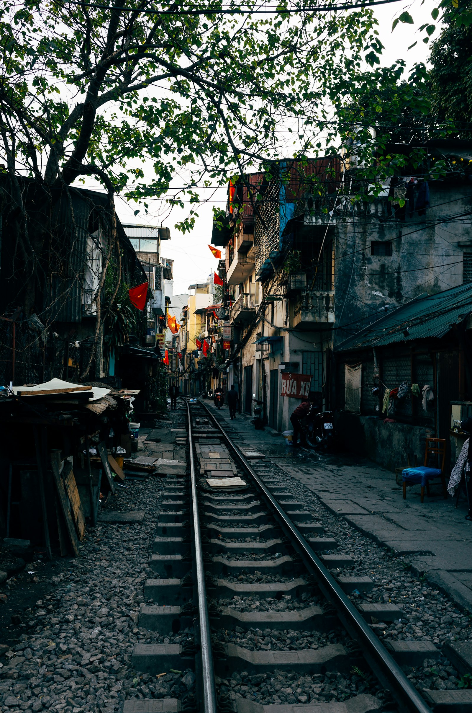 Railway track running through a Vietnamese town