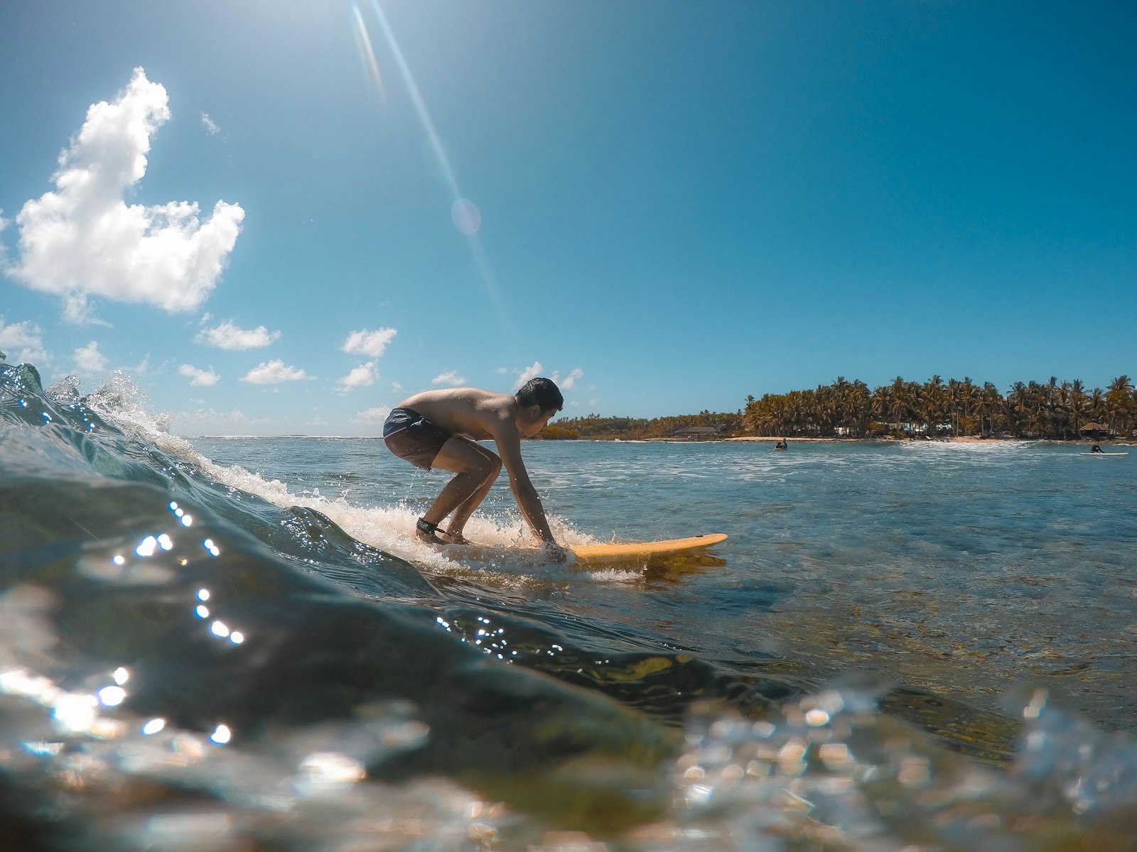 Coastal scene on Siargao Island — the surf-and-palm landscape that draws the remote-work and influencer crowd