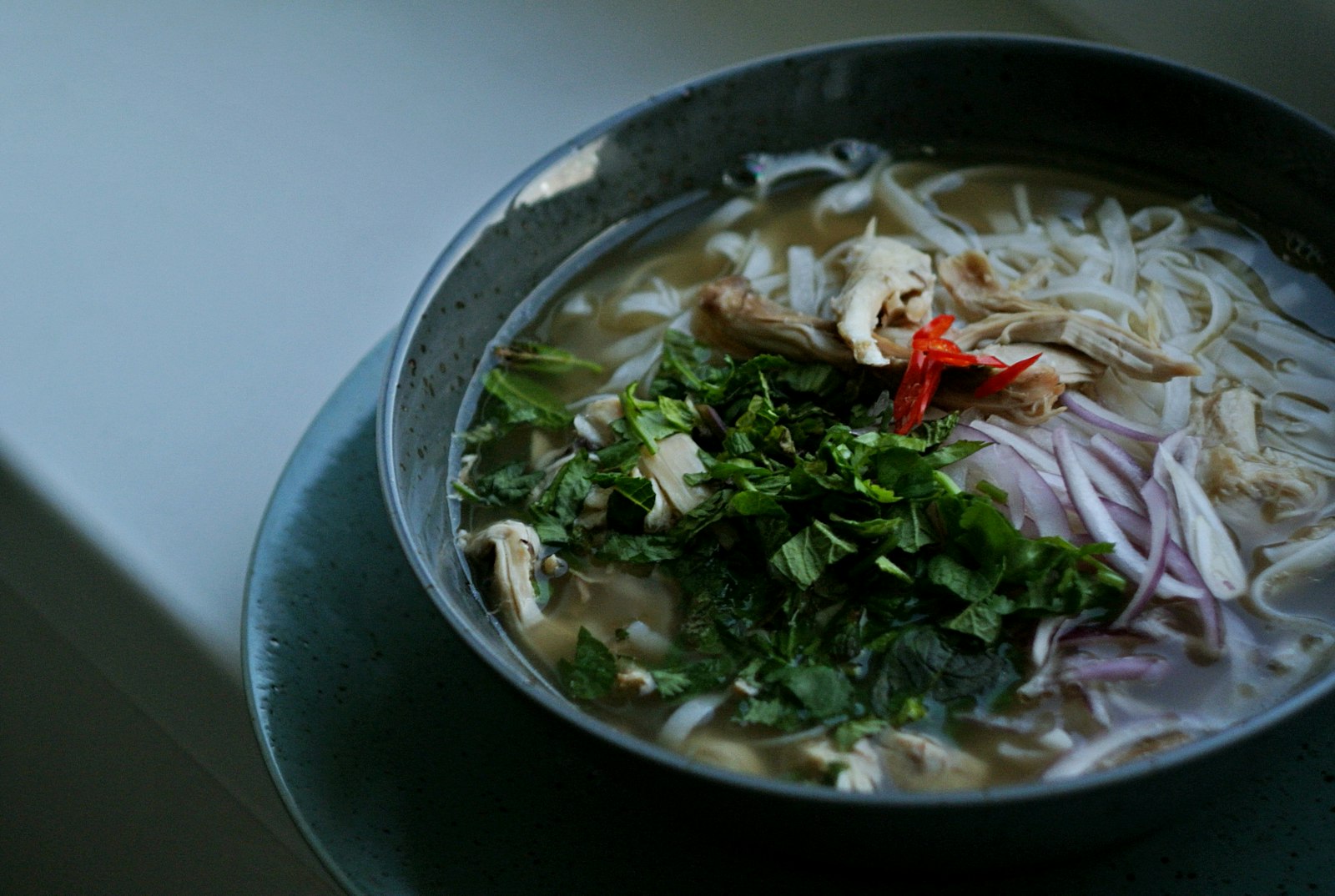 Bowl of Vietnamese pho with chopsticks