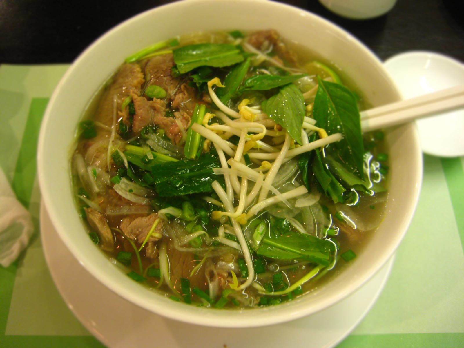 Southern-style Vietnamese pho with herbs and sprouts