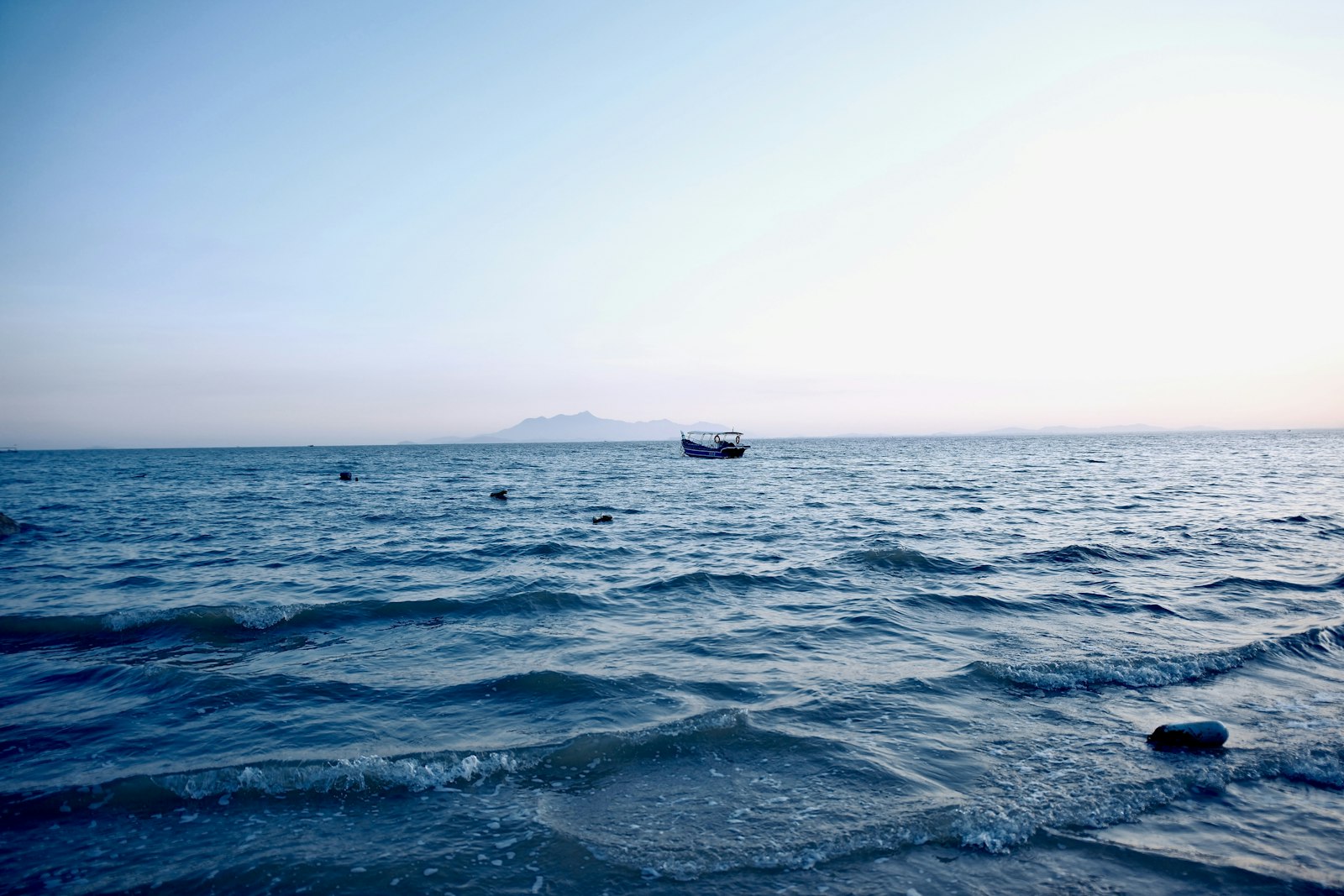 Quiet boats on Penang north coast water